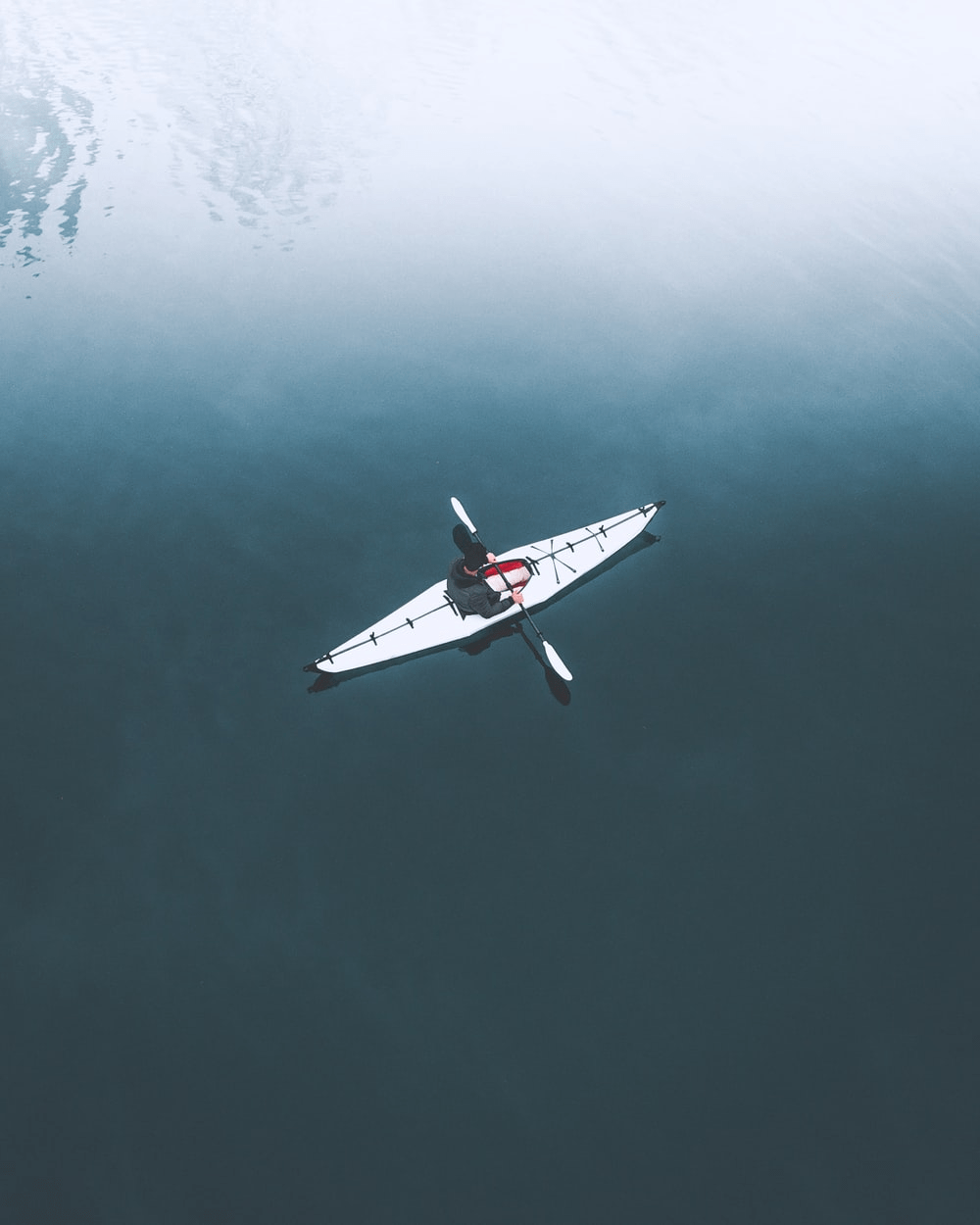 Kayaking in water.