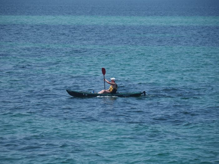Kayaking Water Boat A man kayaking alone