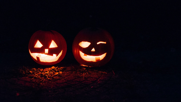 Jack-o-Lanterns two carved pumpkins